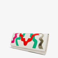 El clutch de piel color crema Tario