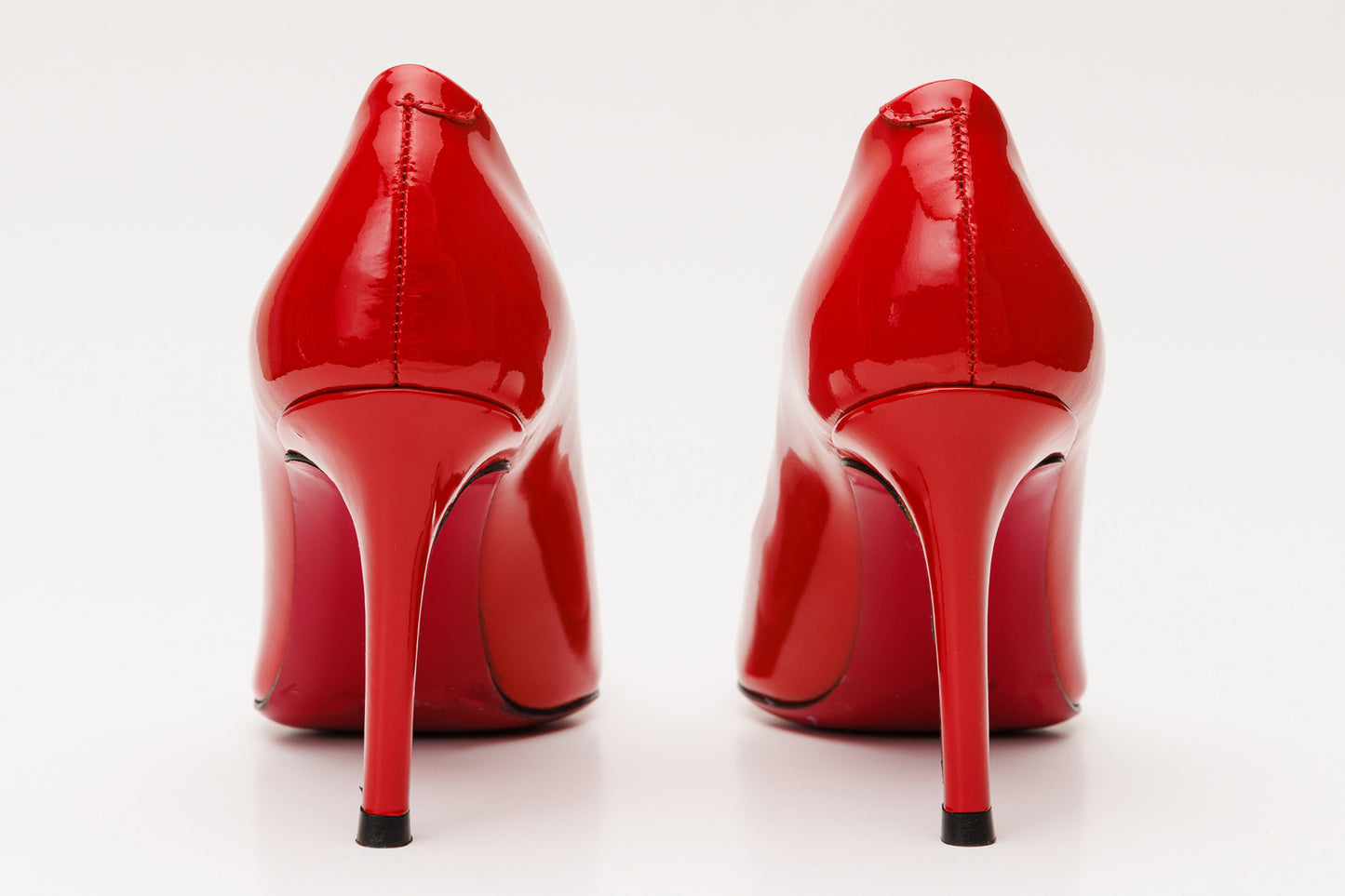 Zapato de salón de piel roja Ege con suela fucsia para mujer 