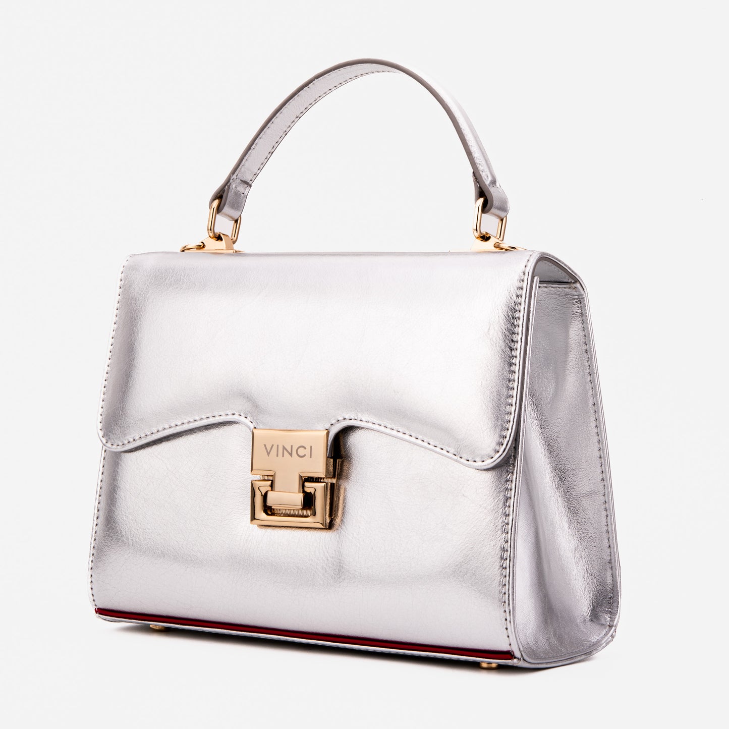 El bolso de mano de piel plateada Ege