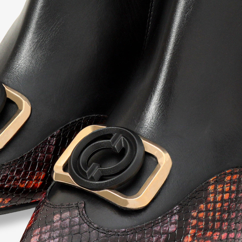 alt
Botín de mujer de cuero gris, negro y fucsia con tacón de bloque - 3