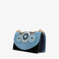 El bolso de mano de piel de ante azul Parama