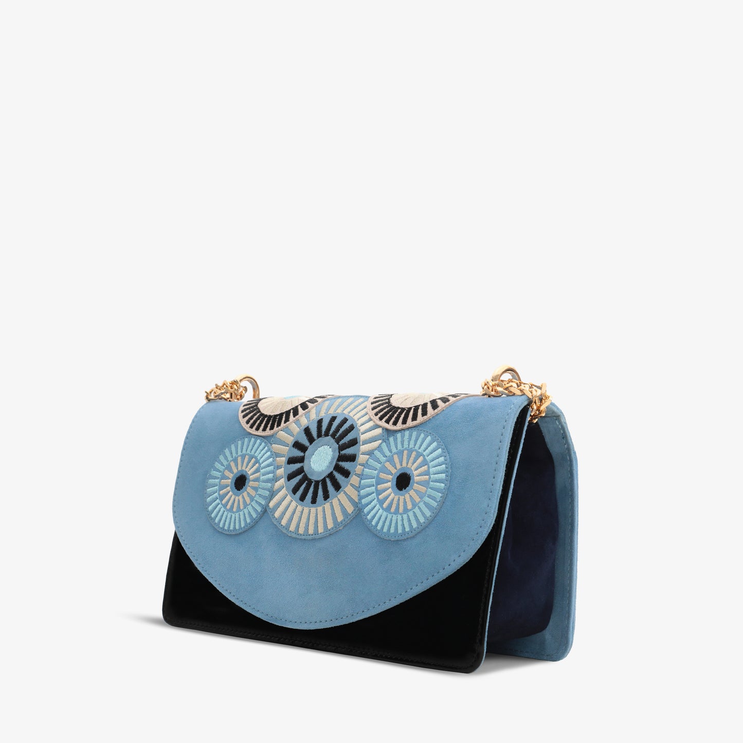 El bolso de mano de piel de ante azul Parama
